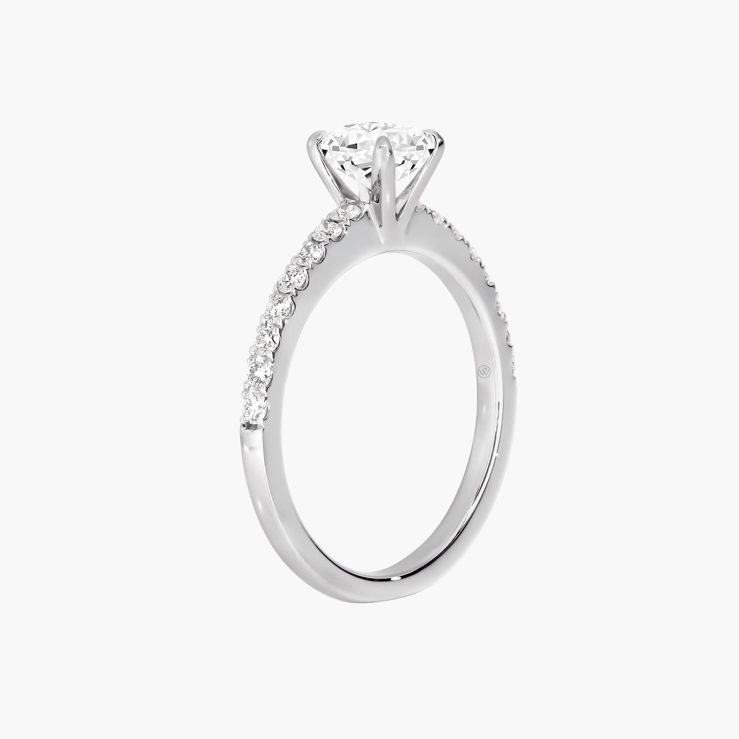 Silver ring with a diamond on a white background