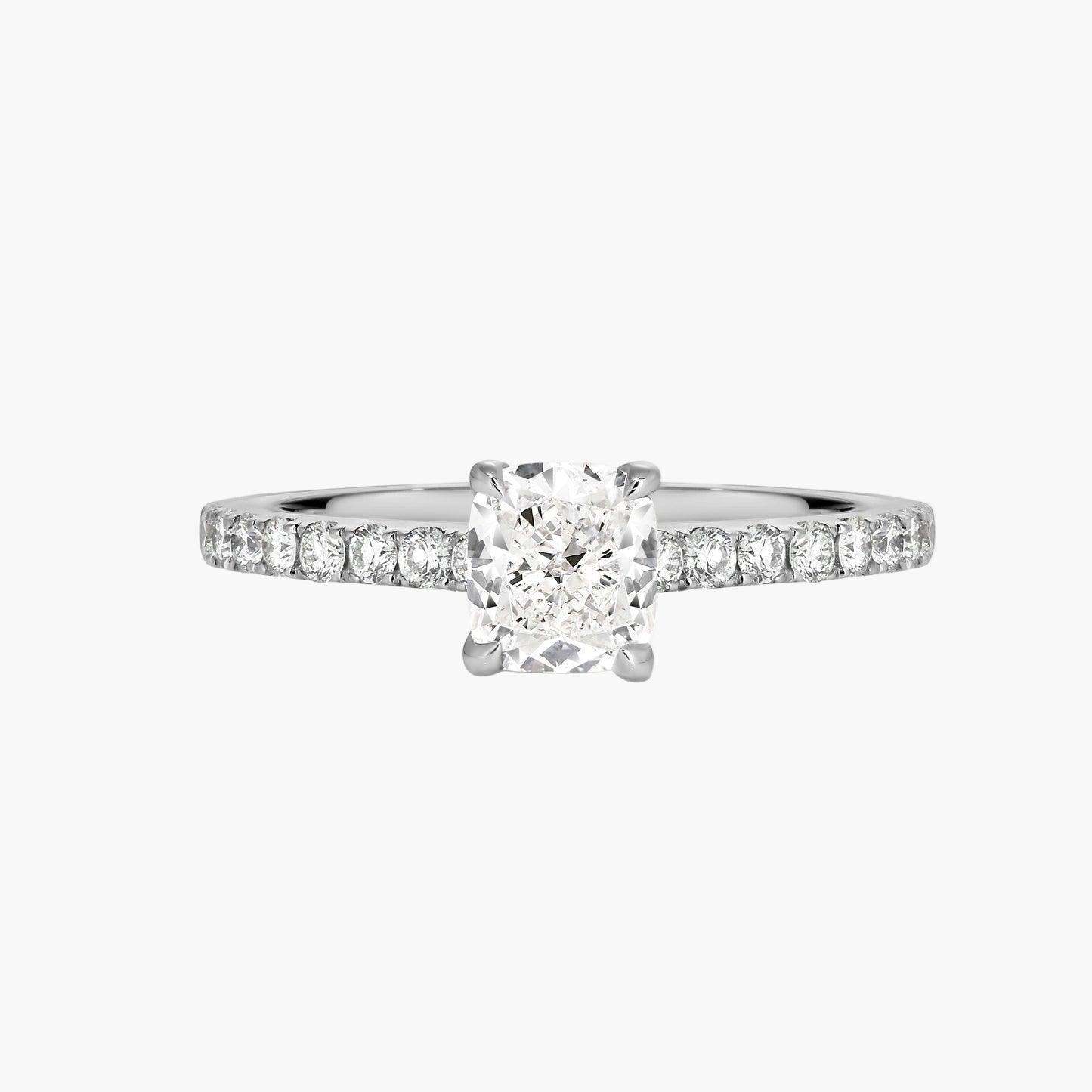 Diamond ring with a central gemstone and smaller diamonds on a white background