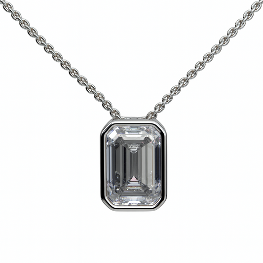 Diamond necklace with emerald-cut pendant on a white background