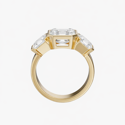 Gold ring with a large diamond and smaller diamonds on a white background