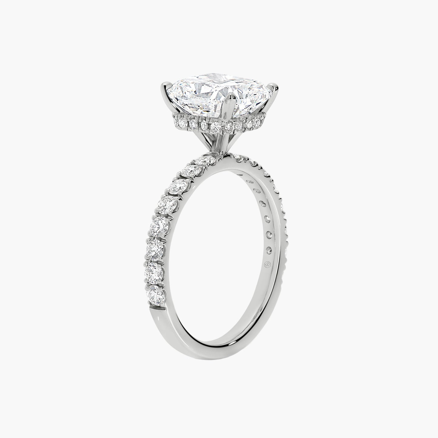 Diamond ring with a prominent central gemstone on a white background
