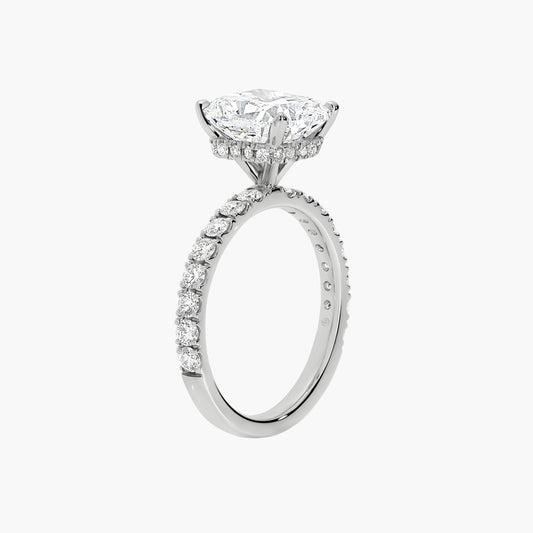 Diamond ring with a prominent central gemstone on a white background