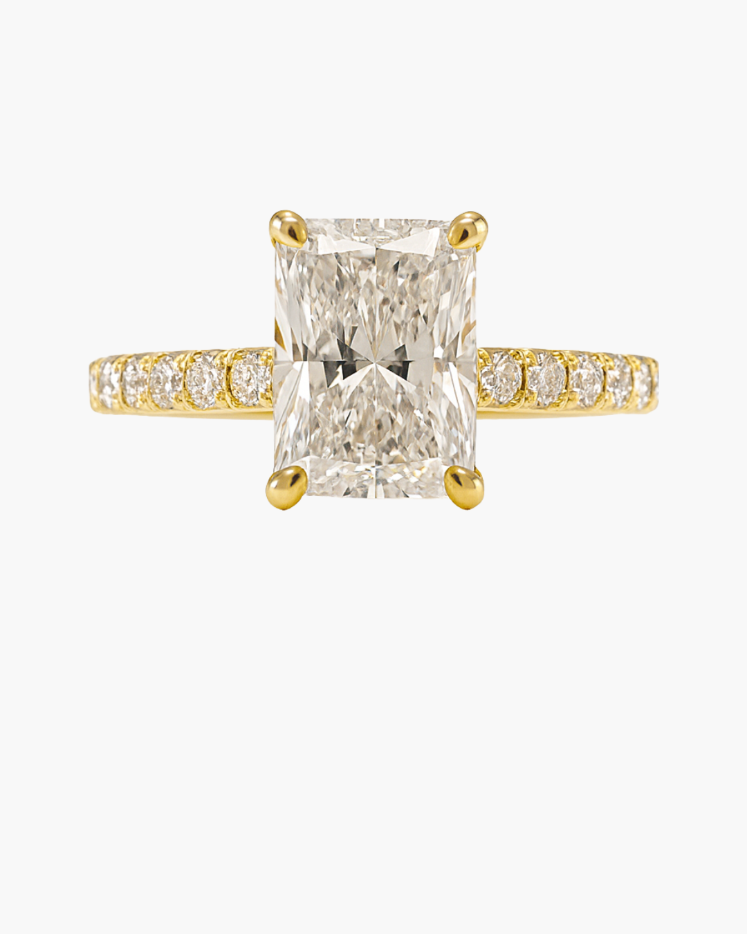 Radiant cut diamond engagement ring in 18ct yellow gold with pavé shoulders and hidden halo