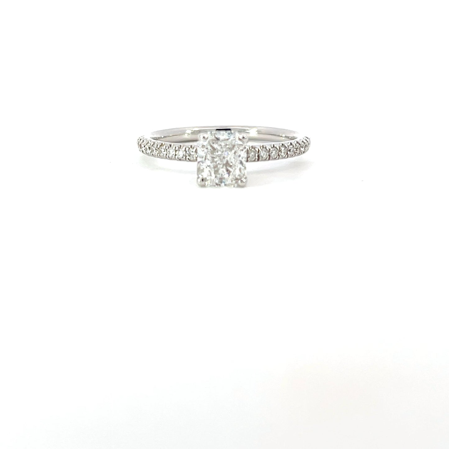 Chantal | Discover this 18ct white gold engagement ring featuring a 0.94ct cushion-cut GIA-certified diamond (D/SI2) with brilliant-cut diamond shoulders. Elegant, timeless, and expertly crafted.