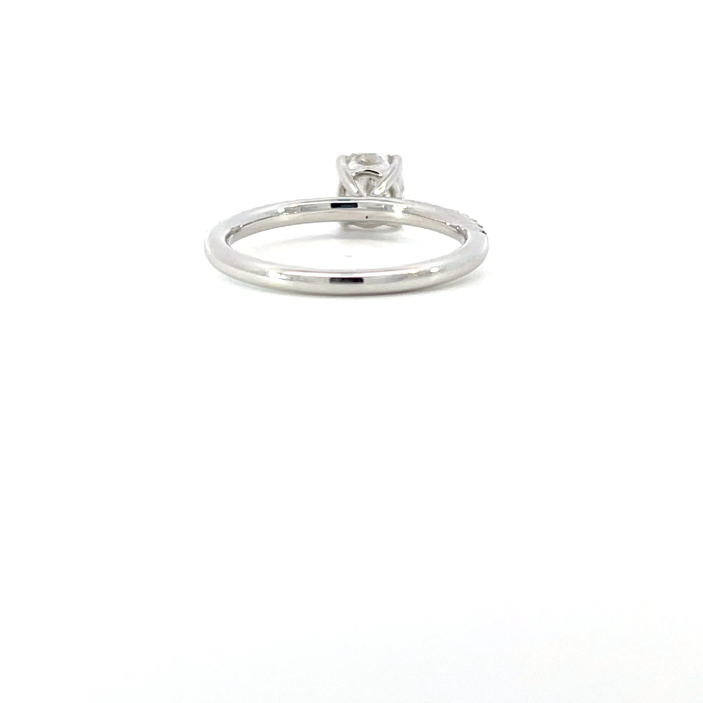 Chantal | Discover this 18ct white gold engagement ring featuring a 0.94ct cushion-cut GIA-certified diamond (D/SI2) with brilliant-cut diamond shoulders. Elegant, timeless, and expertly crafted.