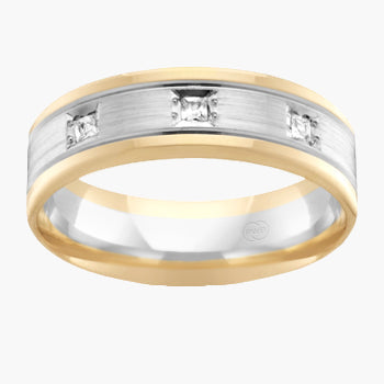 Two-tone gold and silver ring with embedded diamonds on a white background