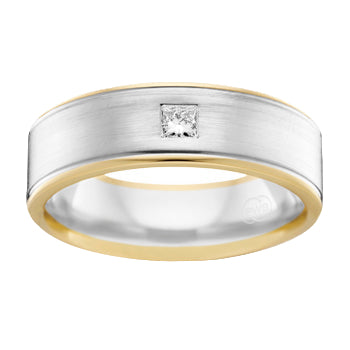 Two-tone ring with a diamond on a white background