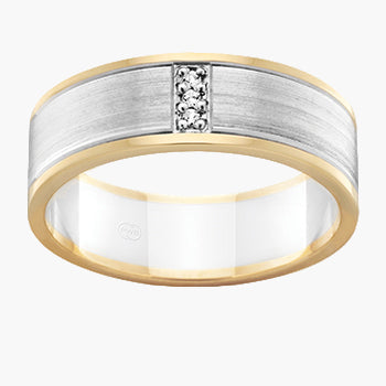 Two-tone ring with a diamond on a white background