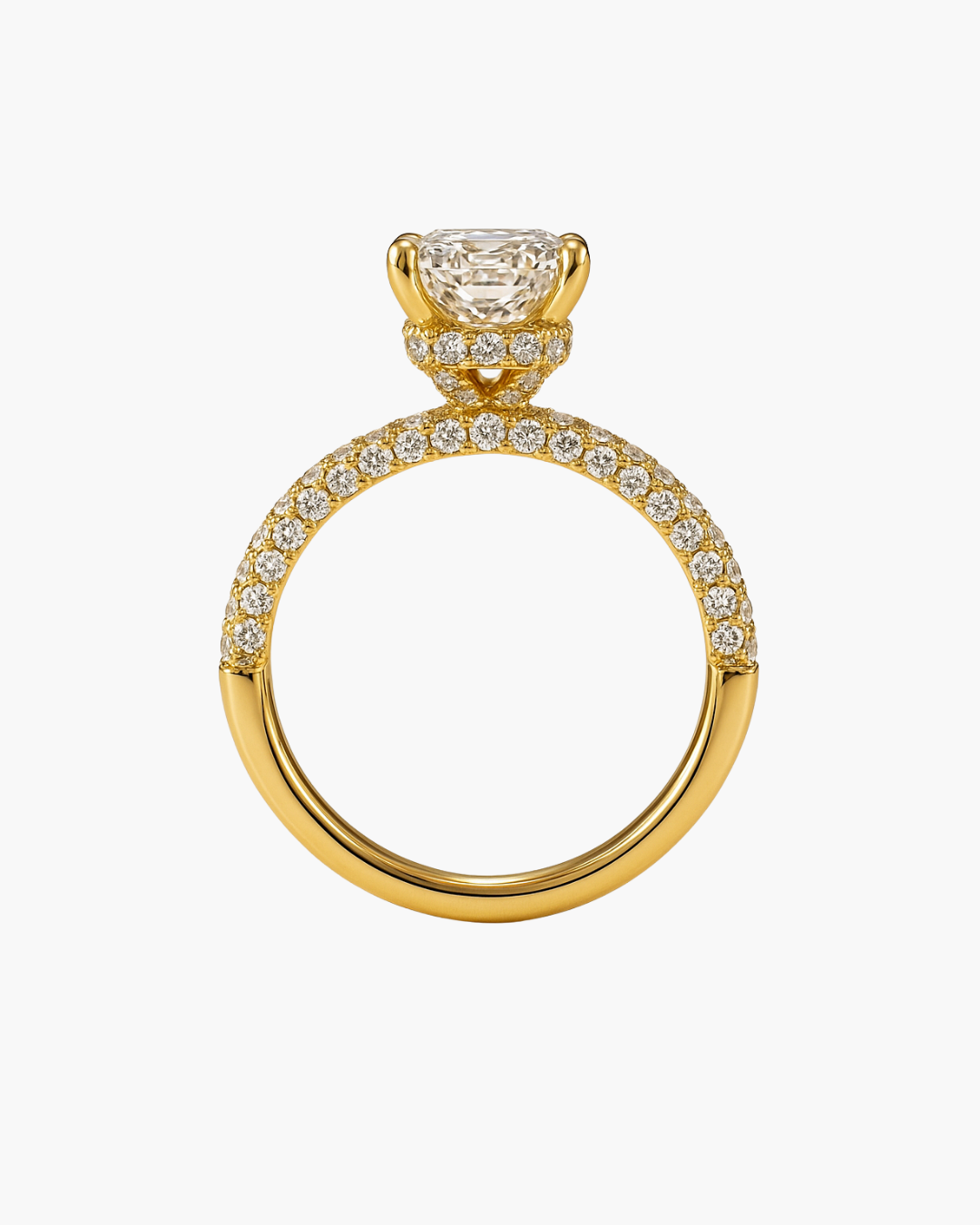 Radiant cut diamond engagement ring in 18ct yellow gold with pavé shoulders and hidden halo