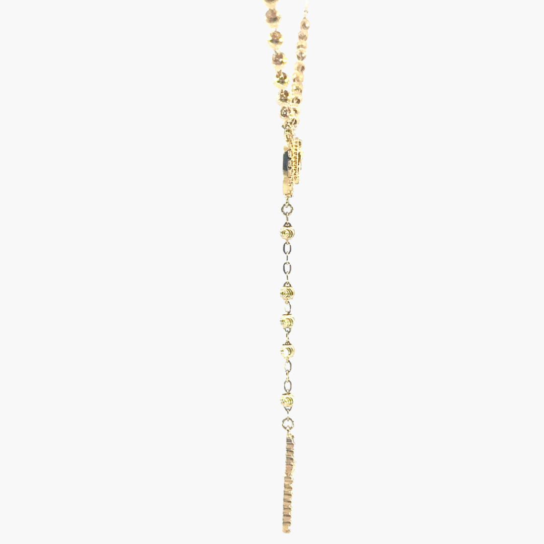 Gold necklace with heart-shaped beads on a white background