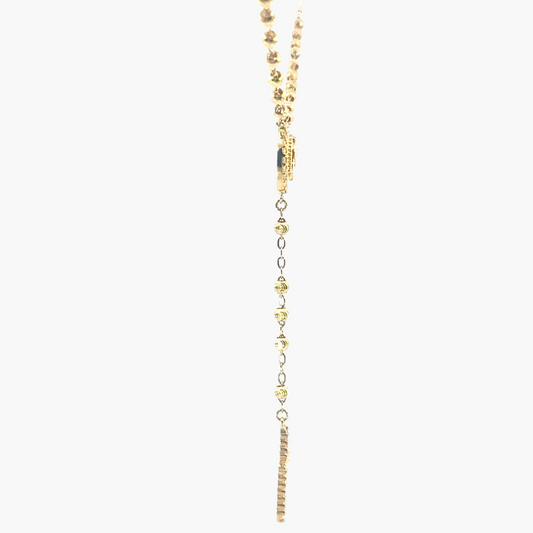 Gold necklace with heart-shaped beads on a white background