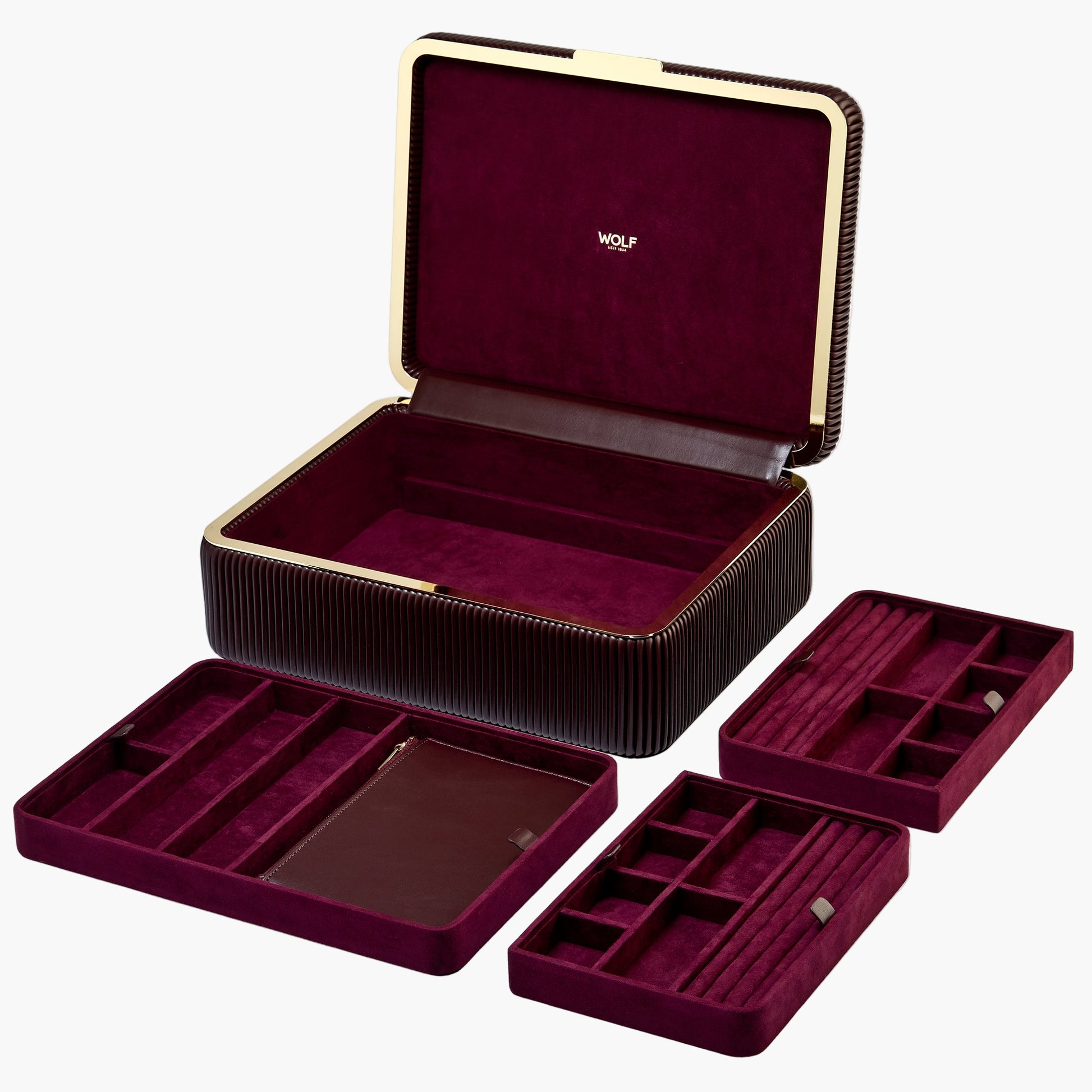 Open jewelry box with compartments on a white background