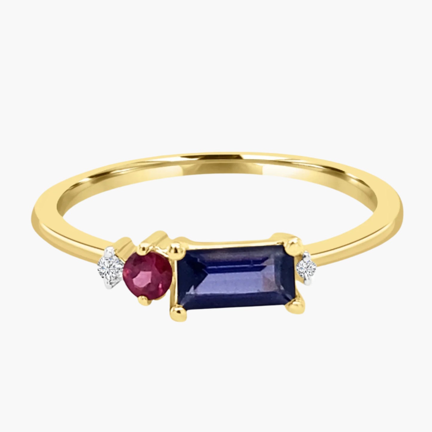 Gold ring with a red gemstone, blue gemstone, and small diamonds on a white background