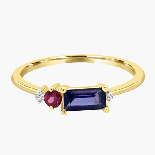 Gold ring with a red gemstone, blue gemstone, and small diamonds on a white background