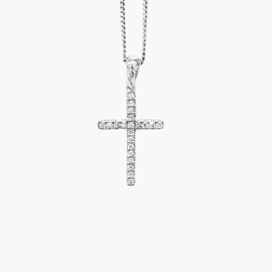 Silver cross pendant necklace on a white background