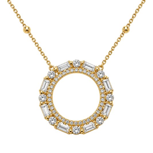 A gold pendant necklace featuring a circular ring paved with small round and baguette-cut clear gemstones, suspended from a delicate gold chain on a white background.