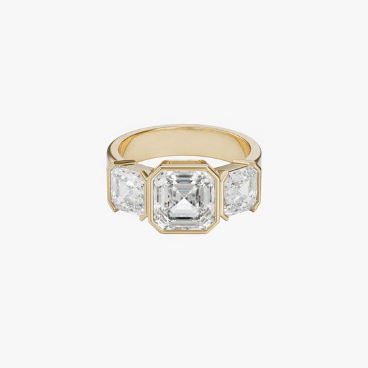 Gold ring with a large diamond and smaller diamonds on a white background