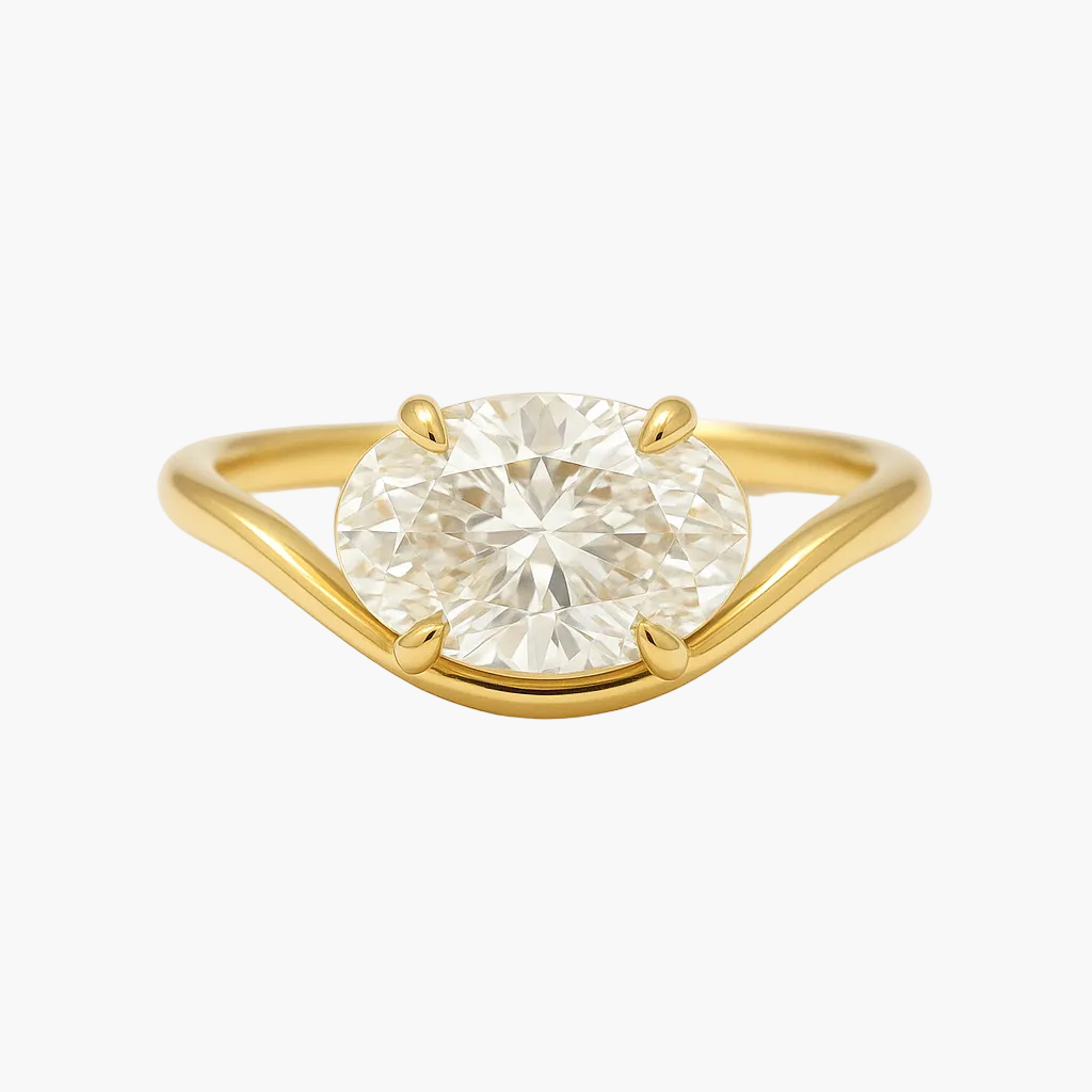 Gold ring with a large diamond on a white background
