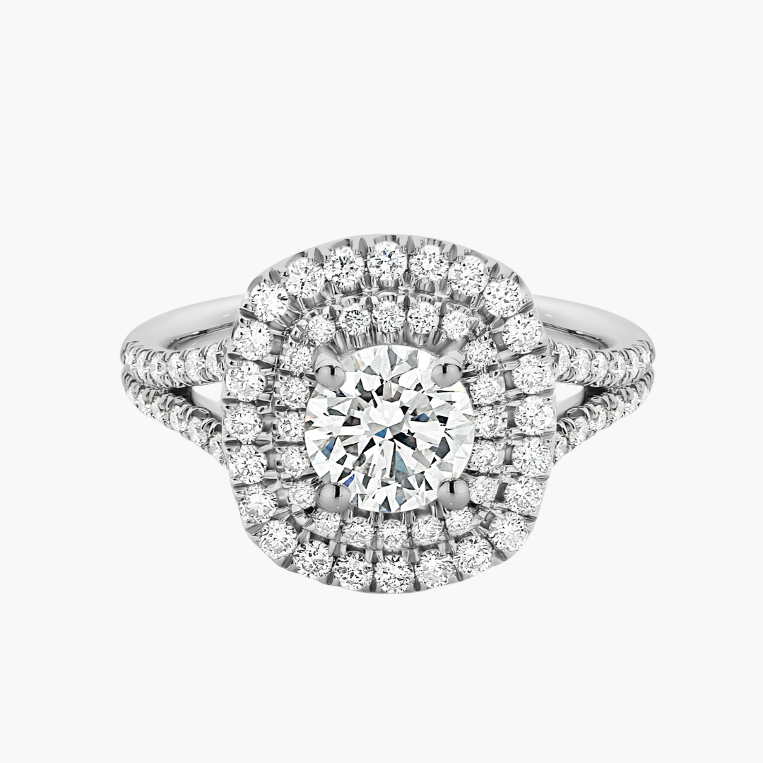 Diamond ring with a halo-style setting on a white background