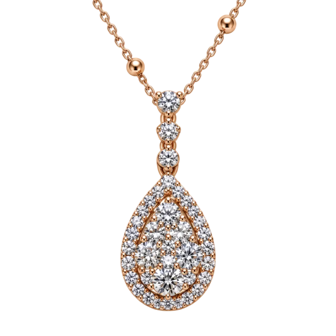 A rose gold necklace with a teardrop-shaped pendant paved with clear diamonds, shown on a clean white background.
