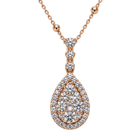A rose gold necklace with a teardrop-shaped pendant paved with clear diamonds, shown on a clean white background.
