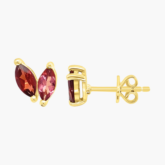 Gold earrings with marquise-shaped red gemstones on a white background