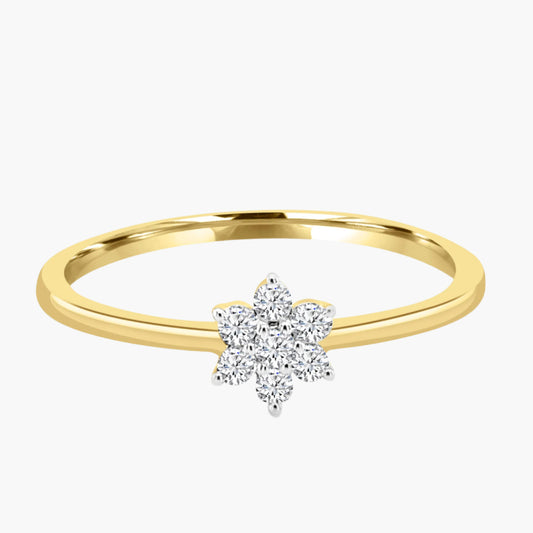 Gold ring with a diamond flower-shaped clasp on a white background