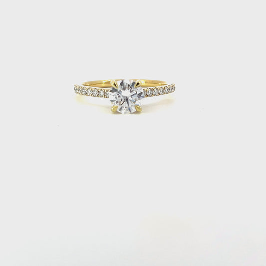 Jasmeen | 18ct yellow gold engagement ring with 0.90ct lab-grown diamond (D/VS), hidden halo, and 0.30ct shoulder diamonds. Timeless, radiant, and sustainably crafted.