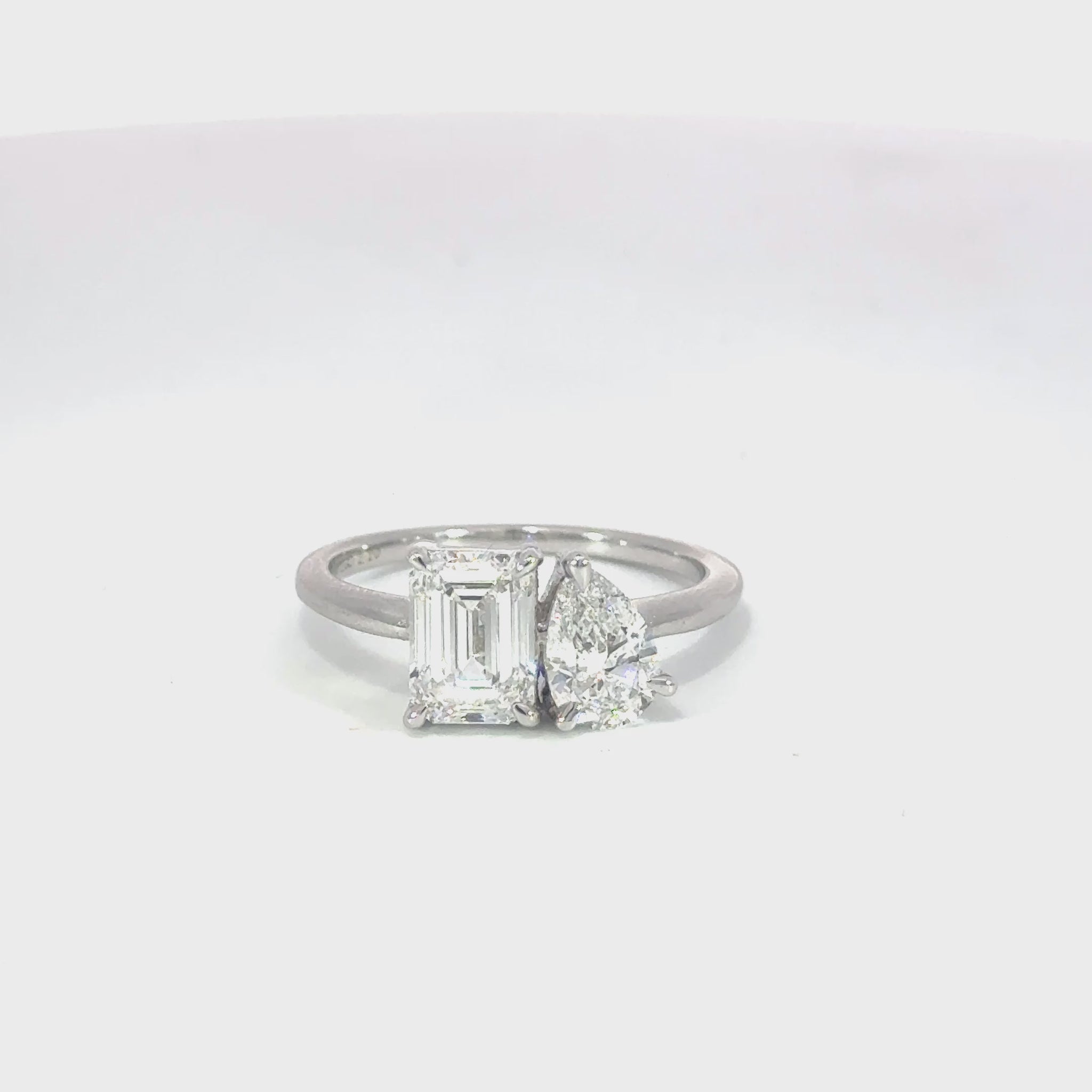 Toi et Moi Pear & Emerald-Cut and Pear Lab-Grown Diamond Engagement Ring in 18ct White Gold – A timeless and elegant design symbolizing unity, featuring a pear and emerald-cut diamond set side by side in a high-polish white gold band.