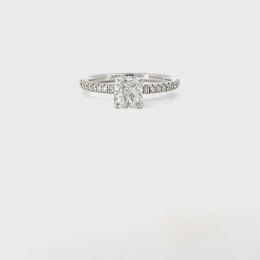 Chantal | Discover this 18ct white gold engagement ring featuring a 0.94ct cushion-cut GIA-certified diamond (D/SI2) with brilliant-cut diamond shoulders. Elegant, timeless, and expertly crafted.