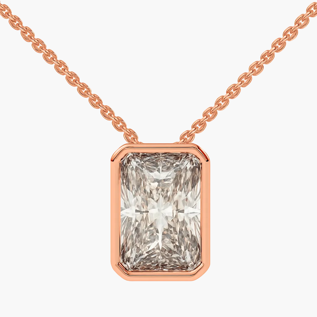 Rose gold necklace with a rectangular diamond pendant on a white background