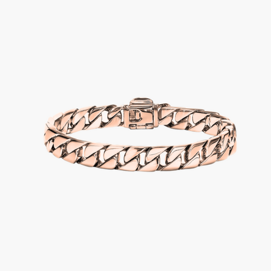 Rose gold chain bracelet on a white background